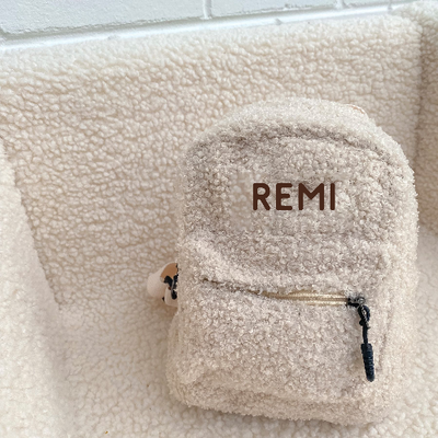 Cream bag with black embroidery